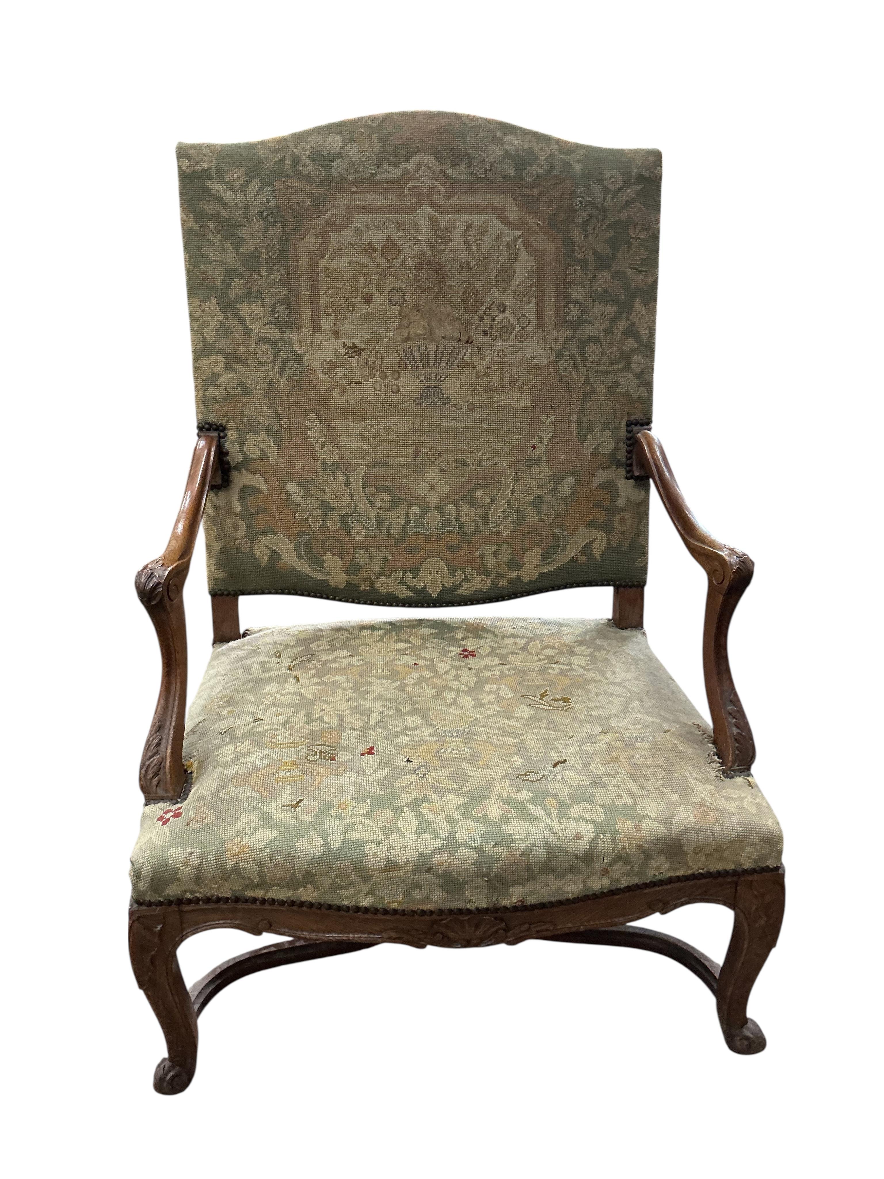 A Louis XV style oak grand fauteuil, width 79cm, depth 66cm, height 113cm, Provenance: The late Kenneth Turner (1936-2025), celebrity florist, designer and perfume retailer, he received the Royal Warrant from the Prince